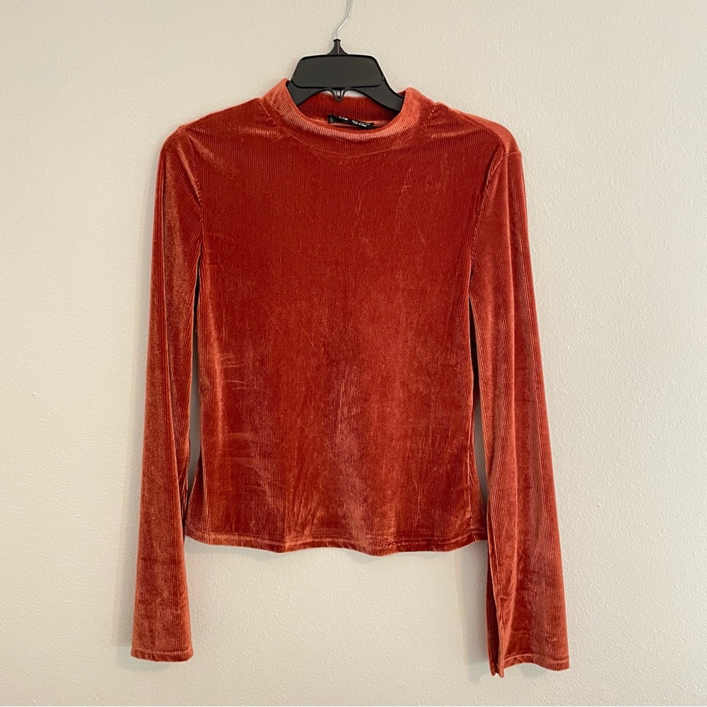 Ribbed orange turtle neck top